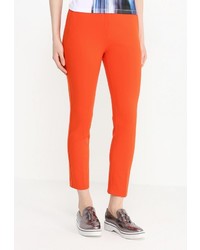 Оранжевые узкие брюки от Cavalli Class