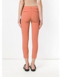 Оранжевые узкие брюки от Blanca