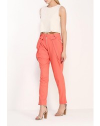 Оранжевые узкие брюки от D.VA