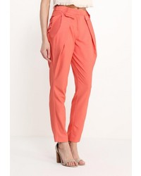 Оранжевые узкие брюки от D.VA