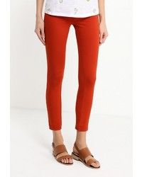Оранжевые узкие брюки от Sisley
