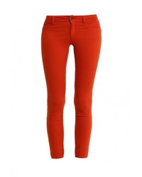Оранжевые узкие брюки от Sisley