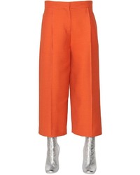 Оранжевые шелковые брюки