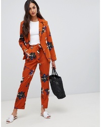 Оранжевые широкие брюки с цветочным принтом от Parisian