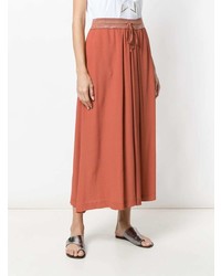 Оранжевые широкие брюки от Lorena Antoniazzi