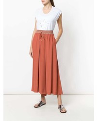 Оранжевые широкие брюки от Lorena Antoniazzi
