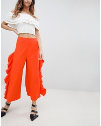 Оранжевые широкие брюки от Miss Selfridge
