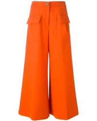 Оранжевые широкие брюки