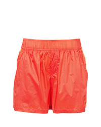 Женские оранжевые шорты от Fenty X Puma