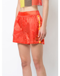 Женские оранжевые шорты от Fenty X Puma