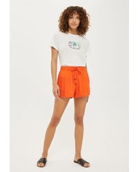 Женские оранжевые шорты от Topshop