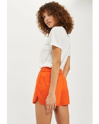 Женские оранжевые шорты от Topshop