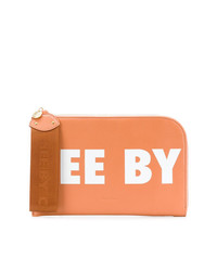 Оранжевый кожаный клатч с принтом от See by Chloe