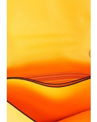 Оранжевый кожаный клатч от Baggini