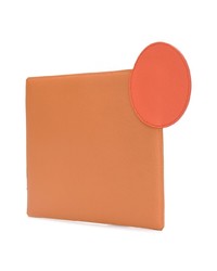 Оранжевый кожаный клатч от Roksanda