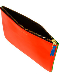 Оранжевый кожаный клатч от Comme des Garcons
