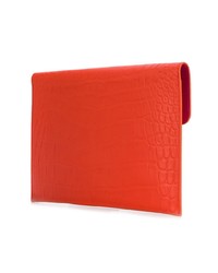 Оранжевый кожаный клатч от Alexander McQueen