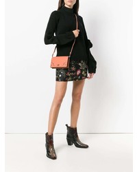 Оранжевый кожаный клатч от Coach