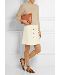 Оранжевый кожаный клатч от Loewe