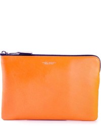 Оранжевый кожаный клатч от Marc Jacobs