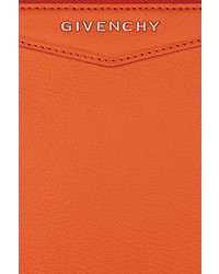 Оранжевый кожаный клатч от Givenchy