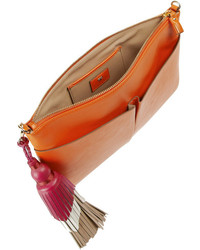 Оранжевый кожаный клатч от Anya Hindmarch