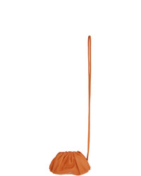 Оранжевый кожаный клатч от Bottega Veneta