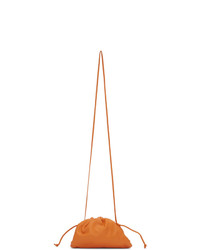 Оранжевый кожаный клатч от Bottega Veneta
