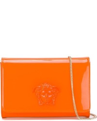 Оранжевый кожаный клатч от Versace