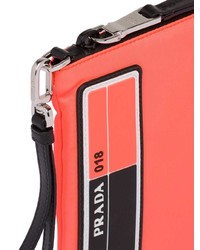 Мужской оранжевый кожаный мужской клатч от Prada