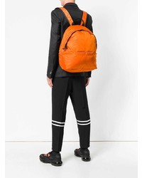 Мужской оранжевый рюкзак от Maison Margiela