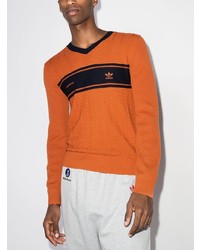Мужской оранжевый свитер с v-образным вырезом с принтом от adidas