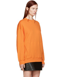 Женский оранжевый свитер от Acne Studios