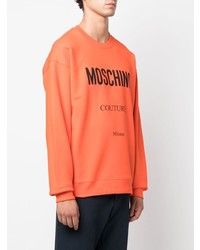 Мужской оранжевый флисовый свитшот с принтом от Moschino