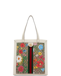 Разноцветная большая сумка из плотной ткани с цветочным принтом от Gucci