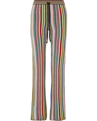 Разноцветные брюки-клеш в вертикальную полоску