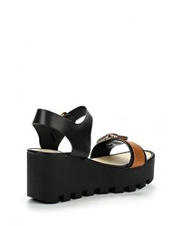 Разноцветные кожаные босоножки на танкетке от Anesia