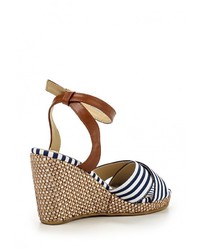 Разноцветные кожаные босоножки на танкетке от Raxmax