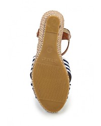 Разноцветные кожаные босоножки на танкетке от Raxmax