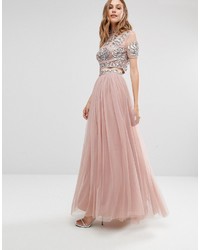 Розовая длинная юбка из фатина с украшением