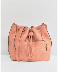Розовая замшевая сумка-мешок от Pieces