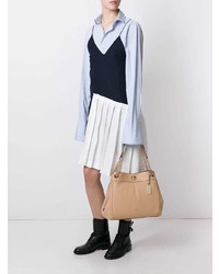 Розовая кожаная большая сумка от Coach