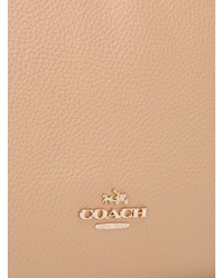 Розовая кожаная большая сумка от Coach