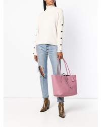 Розовая кожаная большая сумка от Coach