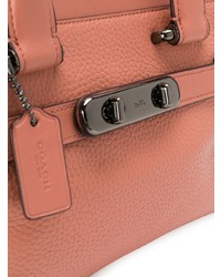 Розовая кожаная большая сумка от Coach