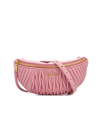 Розовая кожаная поясная сумка от Miu Miu