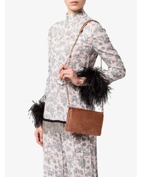 Розовая кожаная сумка через плечо от Prada