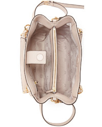 Женская розовая кожаная сумка от Tory Burch