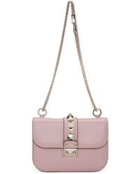 Женская розовая кожаная сумка от Valentino
