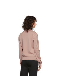 Женская розовая куртка-пуховик от Moncler